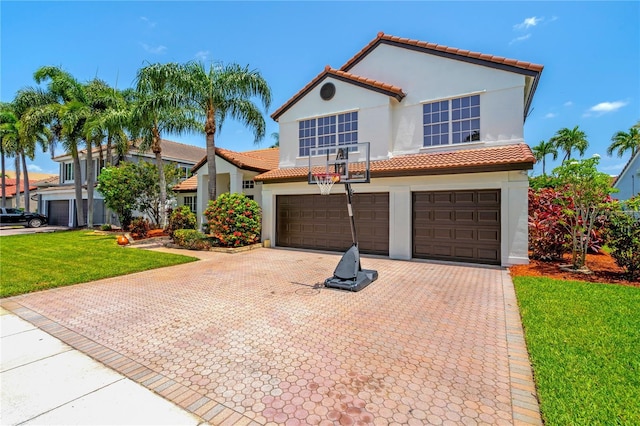 19367 NW 13th St, Pembroke Pines, FL 33029 - mediterranean / spanish home with a garage, a tiled roof, driveway, stucco siding, and a front lawn
