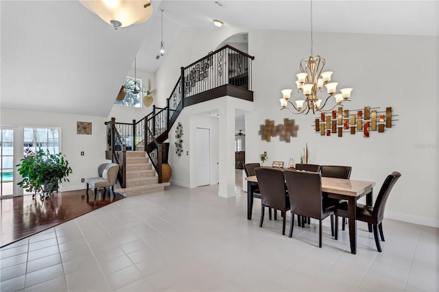 19367 NW 13th St, Pembroke Pines, FL 33029 - dining area with plenty of natural light, a chandelier, stairway, baseboards, and high vaulted ceiling
