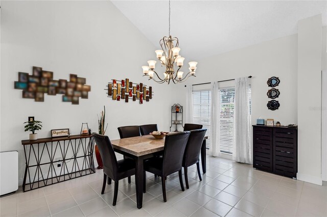 19367 NW 13th St, Pembroke Pines, FL 33029 - dining space with a chandelier, tile patterned flooring, baseboards, and high vaulted ceiling