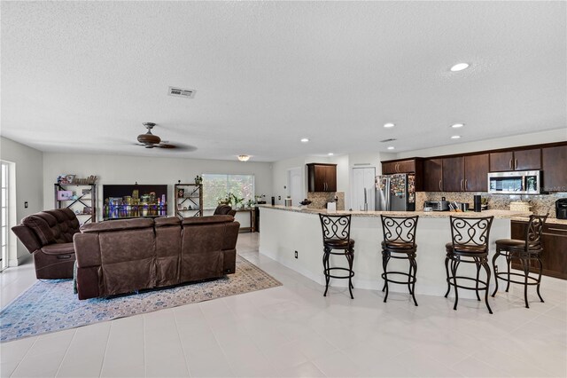 19367 NW 13th St, Pembroke Pines, FL 33029 - living room with a textured ceiling, a ceiling fan, and recessed lighting