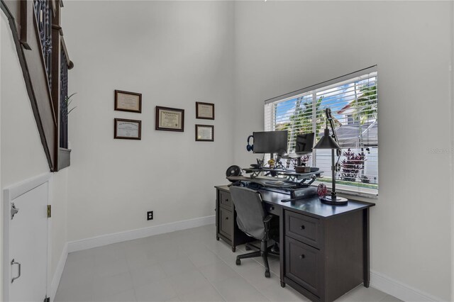 19367 NW 13th St, Pembroke Pines, FL 33029 - home office featuring a towering ceiling and baseboards