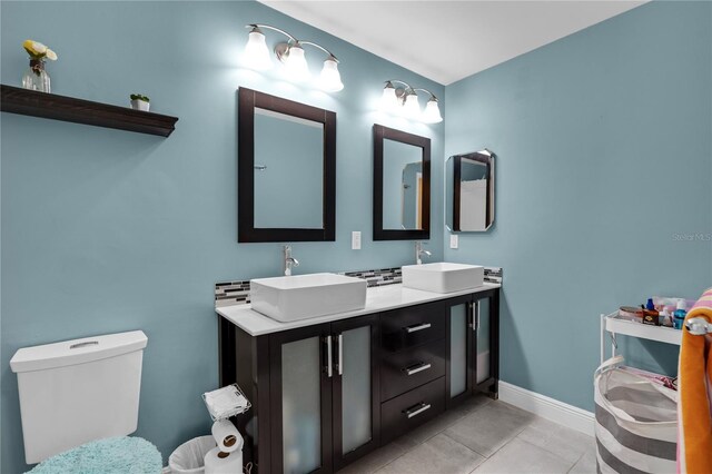 19367 NW 13th St, Pembroke Pines, FL 33029 - full bath with double vanity, toilet, baseboards, and tile patterned floors