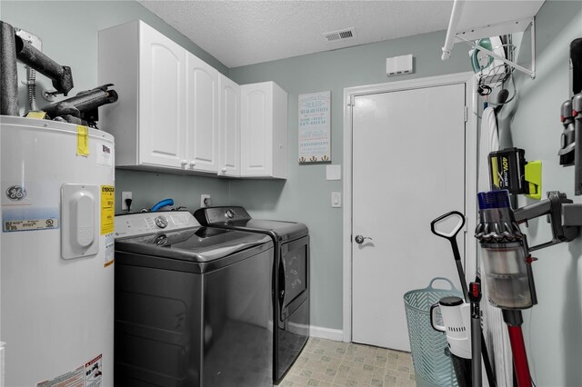 19367 NW 13th St, Pembroke Pines, FL 33029 - laundry area with water heater, cabinet space, washing machine and clothes dryer, a textured ceiling, and baseboards