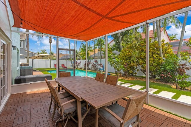 19367 NW 13th St, Pembroke Pines, FL 33029 - sunroom featuring healthy amount of natural light and outdoor dining area