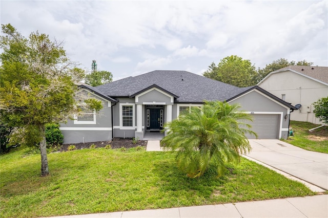 1780 Nature Cove Ln, Clermont, FL 34711 - ranch-style home with stucco siding, driveway, a garage, a front lawn, and a shingled roof