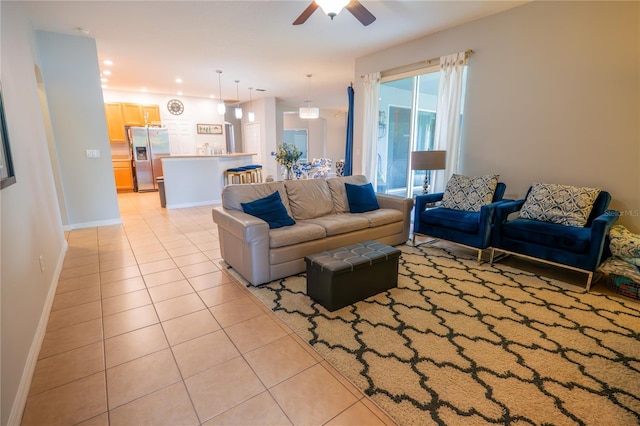 1780 Nature Cove Ln, Clermont, FL 34711 - living area with light tile patterned floors and ceiling fan