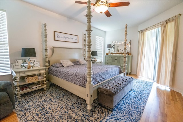 1780 Nature Cove Ln, Clermont, FL 34711 - bedroom with wood finished floors and ceiling fan