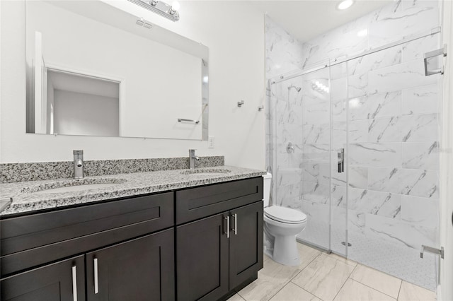 9324 N Fairy Lilly Dr, Citrus Springs, FL 34434 - bathroom with double vanity, marble finish flooring, a marble finish shower, and recessed lighting