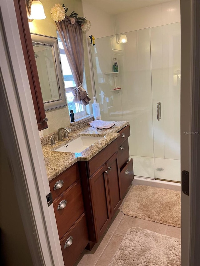 4713 9th St E, Ellenton, FL 34222 - bathroom with vanity, a stall shower, and tile patterned floors