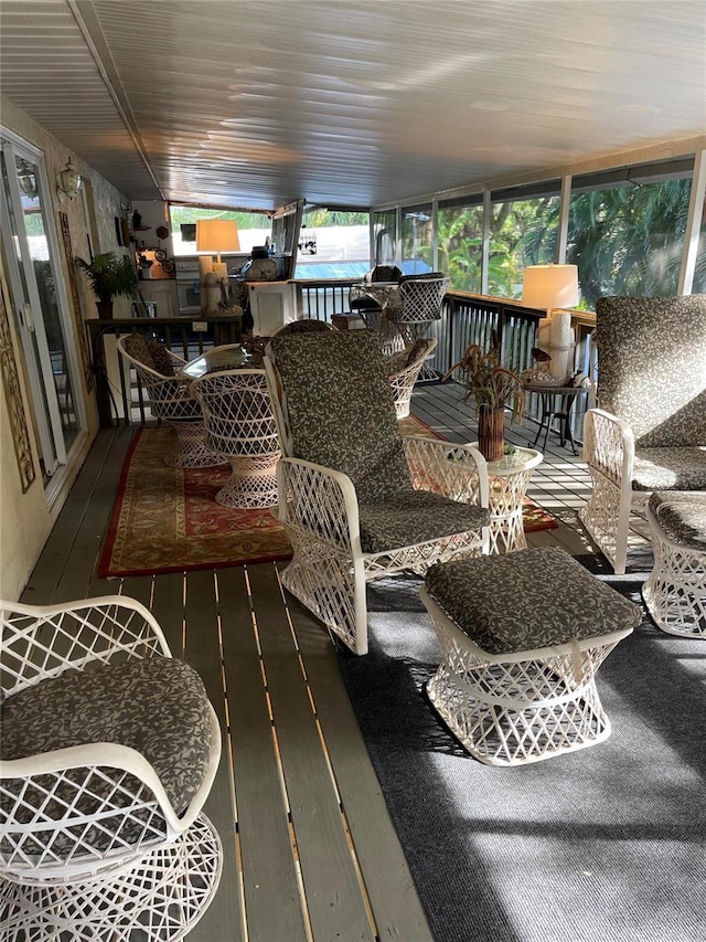 4713 9th St E, Ellenton, FL 34222 - sunroom / solarium featuring outdoor dining space and hardwood / wood-style floors