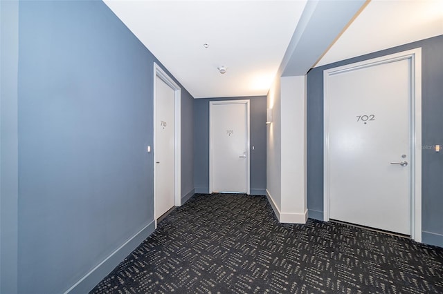 260 S Osceola Ave Unit 710, Orlando, FL 32801 - corridor with baseboards and carpet floors
