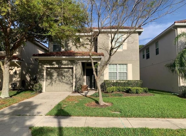 8894 Candy Palm Rd, Kissimmee, FL 34747 - traditional-style home with stucco siding, driveway, and a front yard