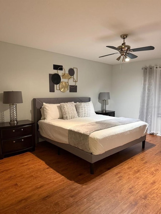 8894 Candy Palm Rd, Kissimmee, FL 34747 - bedroom featuring wood finished floors and ceiling fan