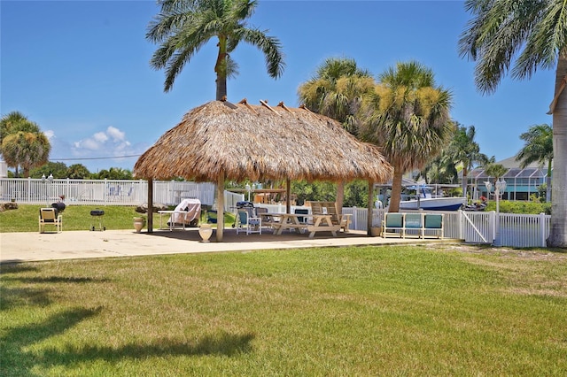 250 N Banana River Dr Unit H11, Merritt Island, FL 32952 - view of community featuring a gazebo, a patio, and a gate