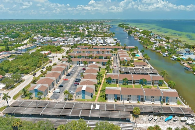 250 N Banana River Dr Unit H11, Merritt Island, FL 32952 - aerial overview of property's location with a nearby body of water and nearby suburban area