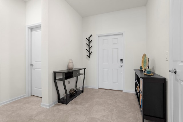 884 Laurel View Way, Groveland, FL 34736 - entryway featuring baseboards and light tile patterned floors