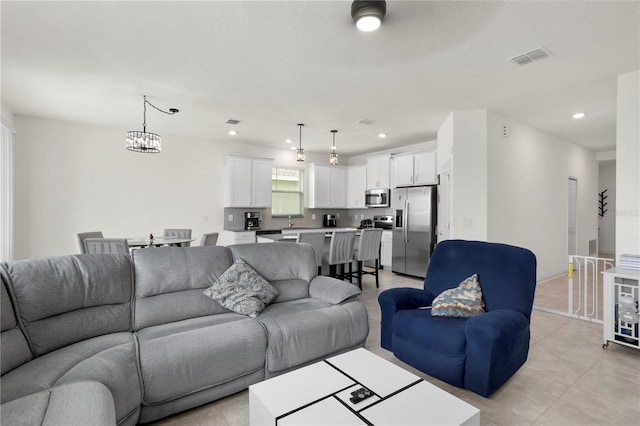 884 Laurel View Way, Groveland, FL 34736 - living room featuring recessed lighting