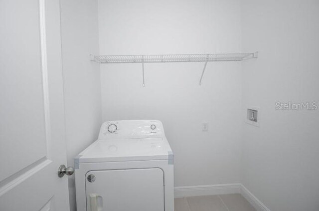 104 W Gondolier Pl, Citrus Springs, FL 34434 - washroom with washer / clothes dryer and baseboards