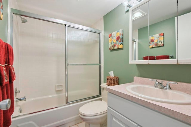 6218 Palma Del Mar Blvd S Unit 103, Saint Petersburg, FL 33715 - bathroom with vanity, toilet, and enclosed tub / shower combo