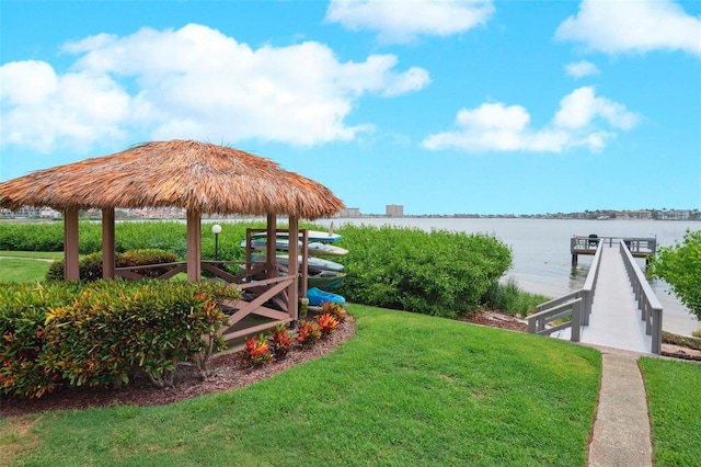 6218 Palma Del Mar Blvd S Unit 103, Saint Petersburg, FL 33715 - view of grassy yard featuring a water view, a gazebo, and a dock