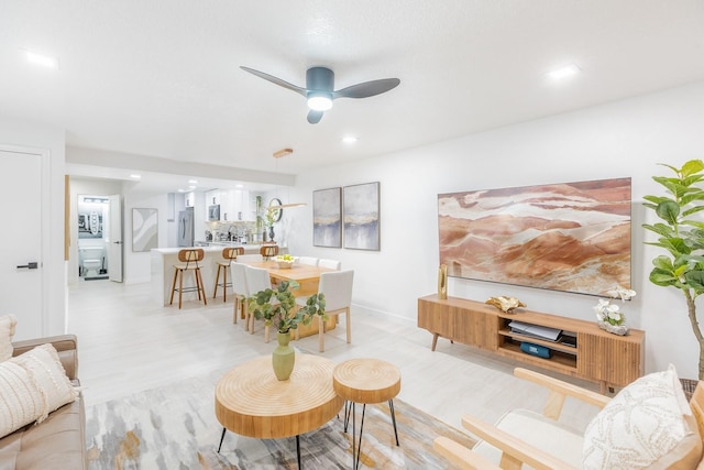 701 S Atlantic Ave Unit Ut21, New Smyrna Beach, FL 32169 - living area featuring a ceiling fan, recessed lighting, light wood-type flooring, and baseboards