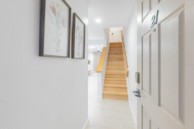 701 S Atlantic Ave Unit Ut21, New Smyrna Beach, FL 32169 - hall with baseboards, stairway, light wood finished floors, and recessed lighting