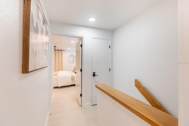 701 S Atlantic Ave Unit Ut21, New Smyrna Beach, FL 32169 - corridor featuring recessed lighting, an upstairs landing, baseboards, and light flooring