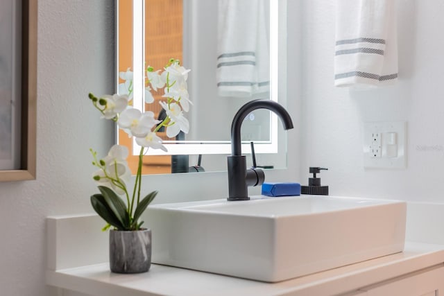 701 S Atlantic Ave Unit Ut21, New Smyrna Beach, FL 32169 - bathroom view of vanity and a textured wall
