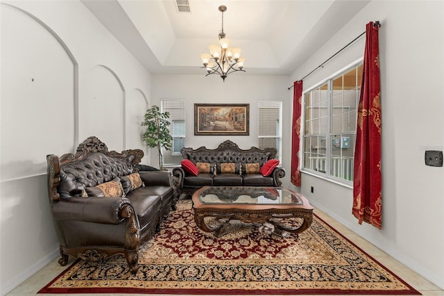 13768 Bluebird Pond Rd, Windermere, FL 34786 - living area featuring a chandelier, baseboards, and a tray ceiling
