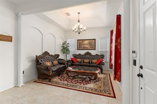 13768 Bluebird Pond Rd, Windermere, FL 34786 - living area featuring a raised ceiling, a chandelier, tile patterned flooring, and baseboards