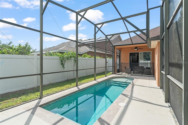 13768 Bluebird Pond Rd, Windermere, FL 34786 - view of pool with a ceiling fan, a patio area, a fenced backyard, and glass enclosure