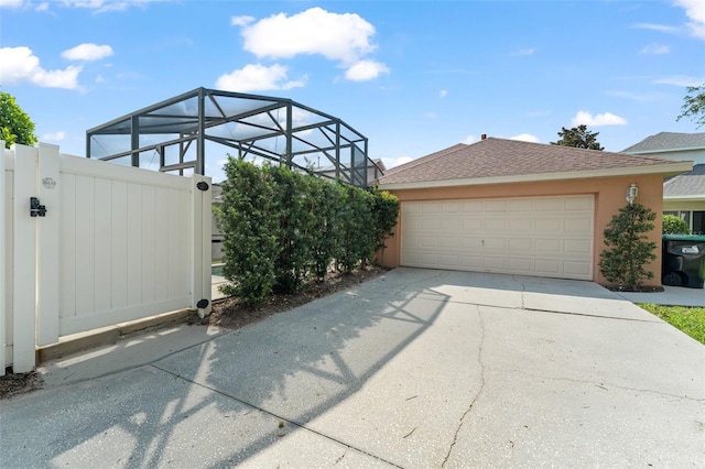13768 Bluebird Pond Rd, Windermere, FL 34786 - view of side of home with a gate and stucco siding