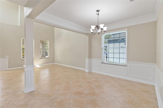 13519 Bicton Ln, Windermere, FL 34786 - unfurnished room featuring light tile patterned floors, healthy amount of natural light, decorative columns, a chandelier, and ornamental molding