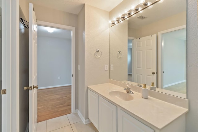 13519 Bicton Ln, Windermere, FL 34786 - bathroom with vanity and tile patterned floors