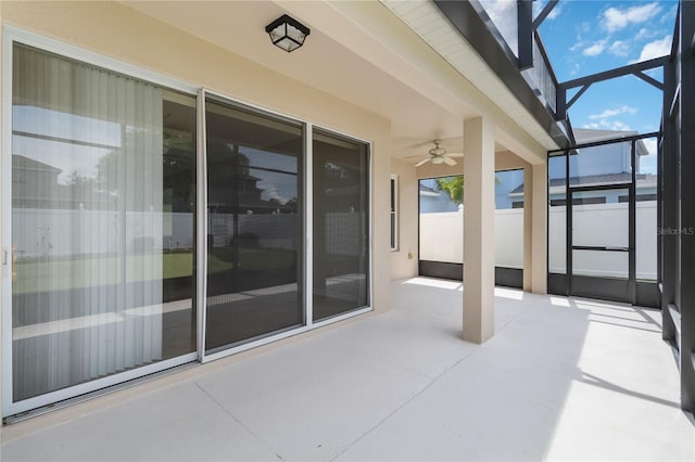 13519 Bicton Ln, Windermere, FL 34786 - view of patio featuring glass enclosure and a ceiling fan