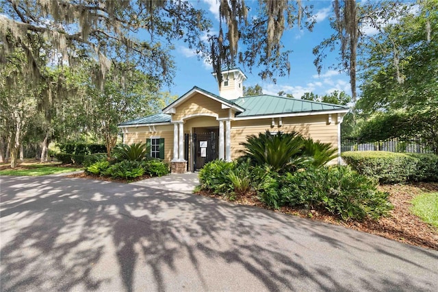 13519 Bicton Ln, Windermere, FL 34786 - view of front of home with a metal roof
