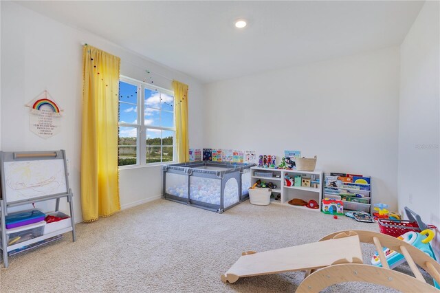 1854 Juneberry St, Clermont, FL 34715 - rec room featuring carpet and baseboards