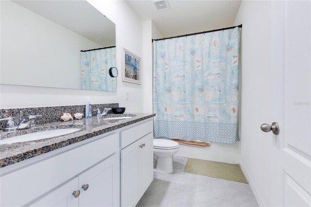 1854 Juneberry St, Clermont, FL 34715 - bathroom with double vanity and tile patterned flooring