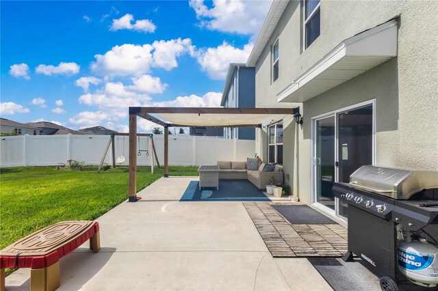 1854 Juneberry St, Clermont, FL 34715 - fenced backyard featuring grilling area, a patio, and outdoor lounge area