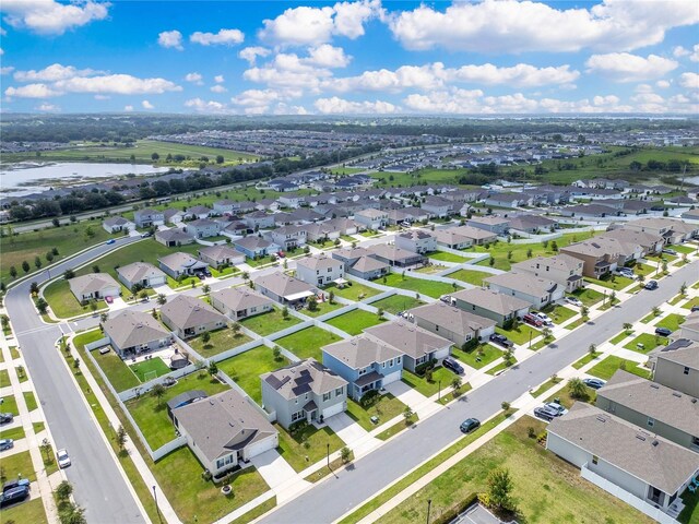 1854 Juneberry St, Clermont, FL 34715 - aerial view of residential area with a large body of water