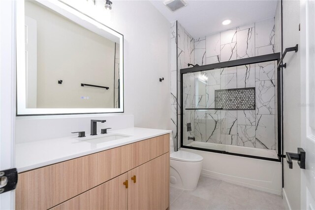 5161 Dove Tree St, Orlando, FL 32811 - full bath featuring vanity, bath / shower combo with glass door, tile patterned floors, and recessed lighting