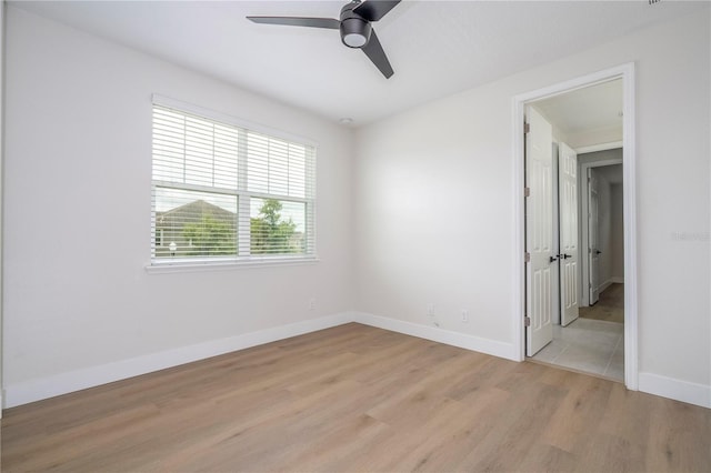 5161 Dove Tree St, Orlando, FL 32811 - empty room featuring ceiling fan and light wood-type flooring