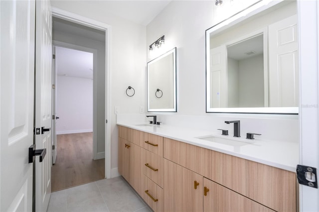 5161 Dove Tree St, Orlando, FL 32811 - full bathroom with double vanity and tile patterned floors