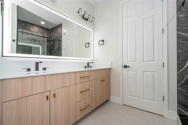 5161 Dove Tree St, Orlando, FL 32811 - full bath with double vanity, a marble finish shower, and tile patterned flooring