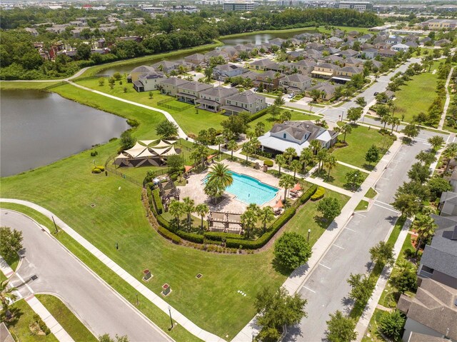 5161 Dove Tree St, Orlando, FL 32811 - drone / aerial view of a nearby body of water and a pool