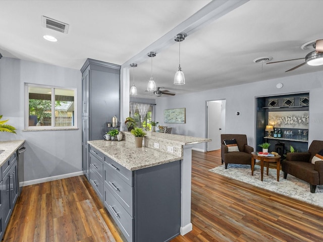 2244 Brookshire Ave, Winter Park, FL 32792 - kitchen with gray cabinetry, a ceiling fan, a peninsula, and open floor plan