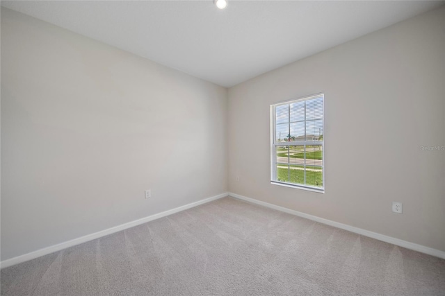 489 Panaro Ln, Haines City, FL 33844 - carpeted spare room with baseboards