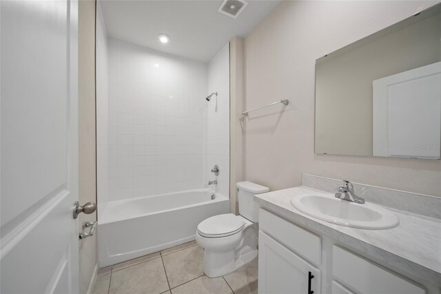 489 Panaro Ln, Haines City, FL 33844 - bathroom with vanity, tile patterned floors, and tub / shower combination