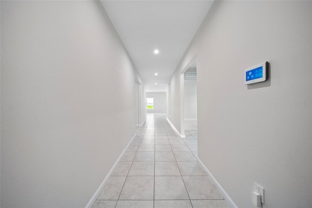 489 Panaro Ln, Haines City, FL 33844 - hall featuring light tile patterned floors, recessed lighting, and baseboards