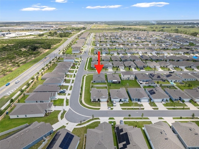 489 Panaro Ln, Haines City, FL 33844 - aerial view of property and surrounding area featuring nearby suburban area